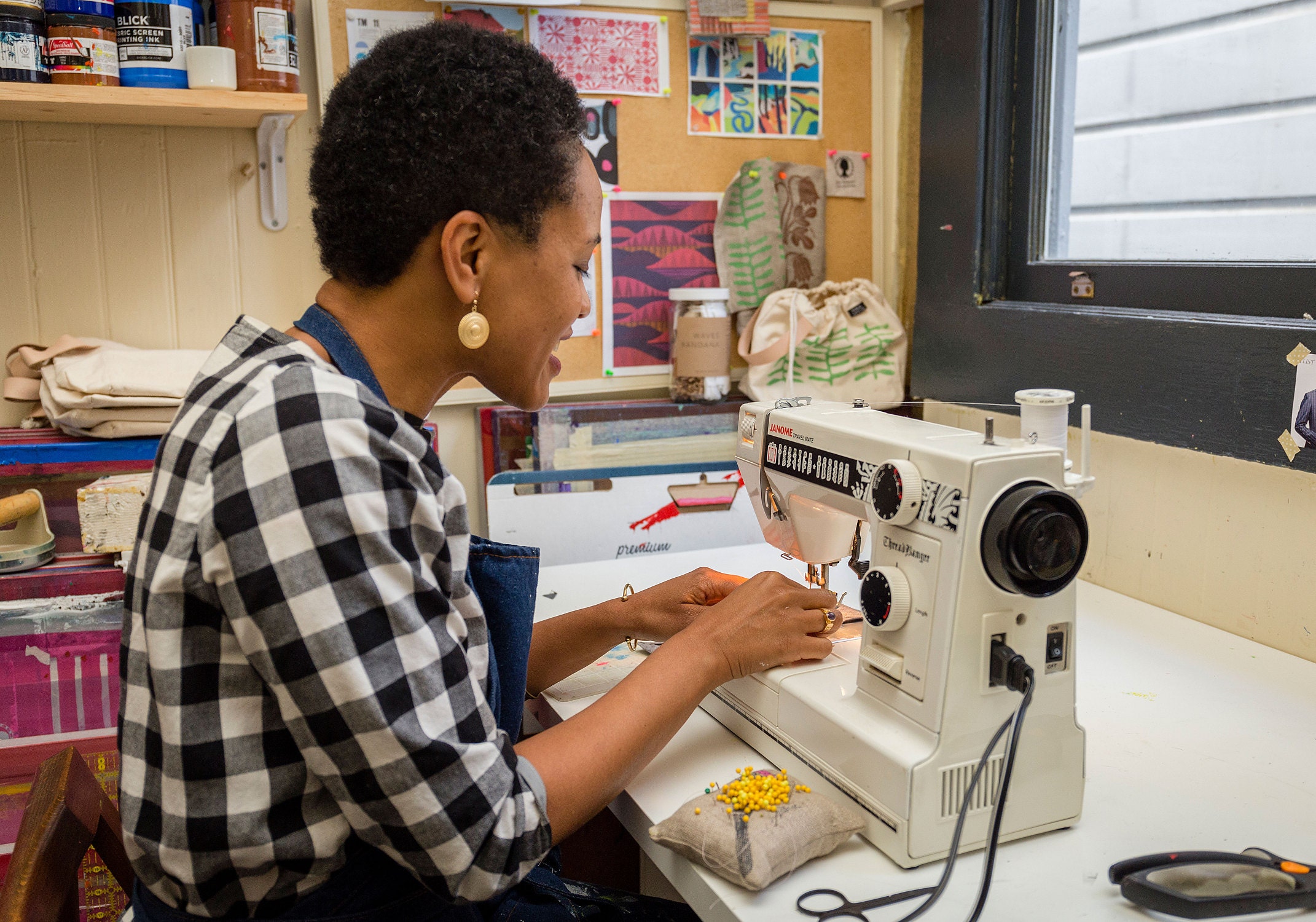 Jen Hewett at her sewing machine