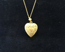 Popular items for gold heart locket on Etsy