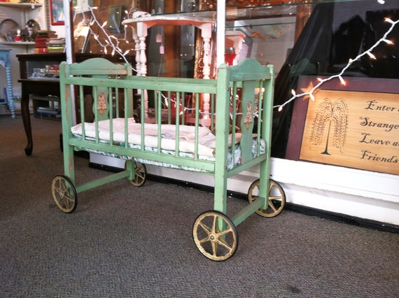 antique doll crib with wheels