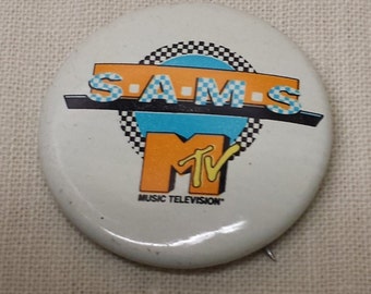 Vintage Music Television MTV SAMS Pin Back Button from the 1980s