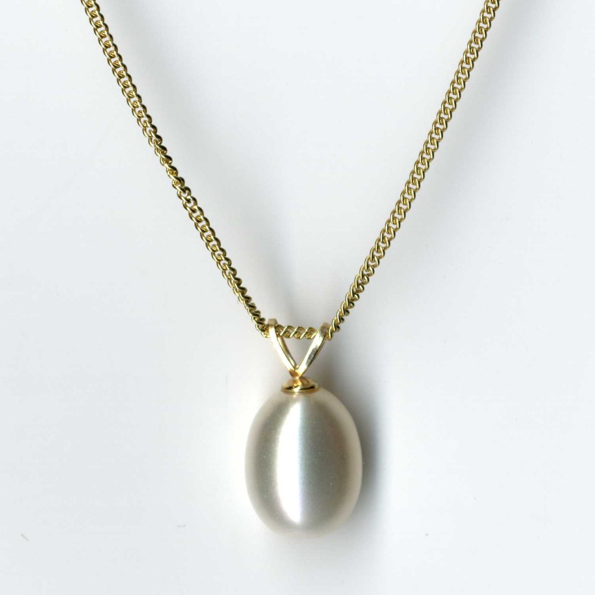 Pearl drop and 9K gold necklace
