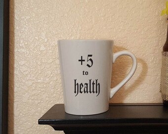 Plus 5 to Health coffee mug, dungeons and dragons, geek, funny, vinyl mugs