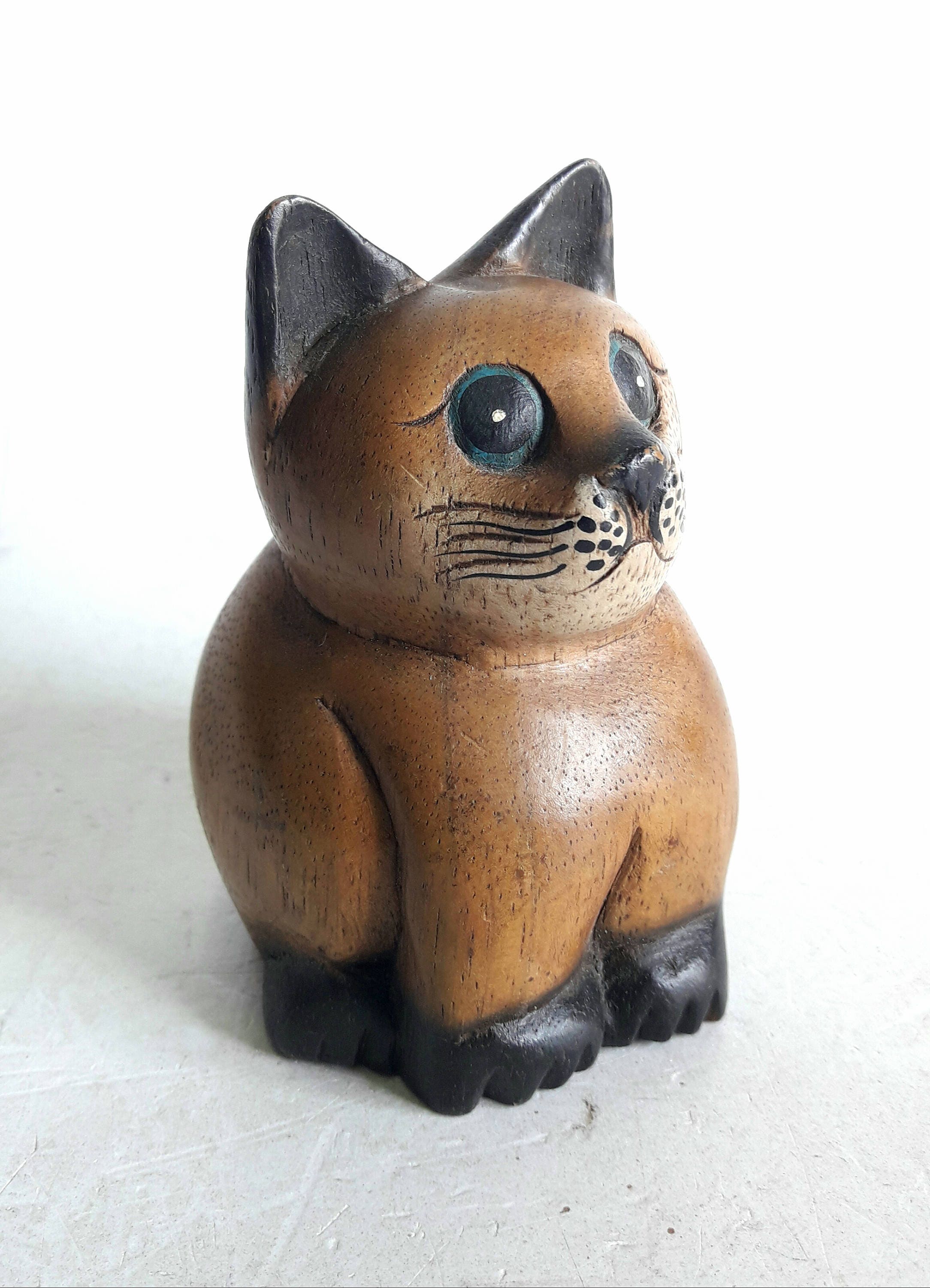 wooden cat sculpture