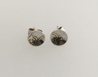 Sterling silver and gold swirl earrings