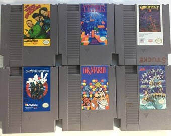 Original NES Games: The Three Stooges, Tetris, Gauntlet II, Ghostbusters II, Dr Mario, Adventures of Tom Sawyer, Skate or Die, Narc, Yoshi