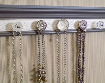 Jewelry organizer  CHOOSE 5, 7 or 9 KNOBS  Can add hooks also. This gray wall  necklace rack has shimmery white  embossed background .  gift