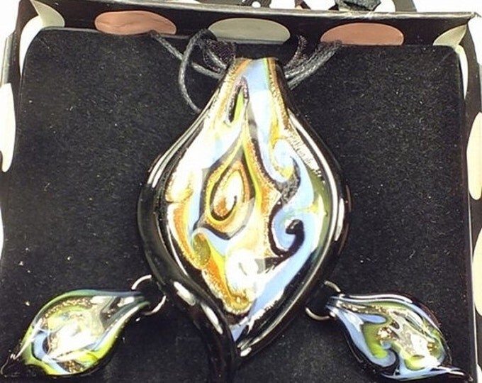 Storewide 25% Off SALE Gorgeous Murano-inpsired necklace and earring set Featuring rich shades swirls on a silver and copper foil backdrop