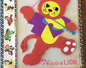vintage puzzles - Take it Out and Put it Back Together Again plastic puzzles - No. 204 Lion & No. 202 Dog