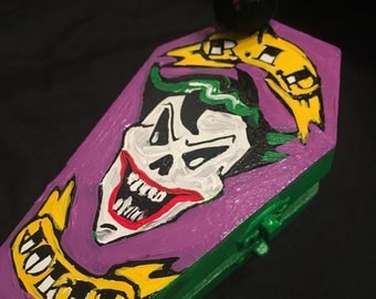 Joker Box. Skeleton Joker Skull. Comic Book Coffin Box villain tattoo Banner With Skeleton and Raven