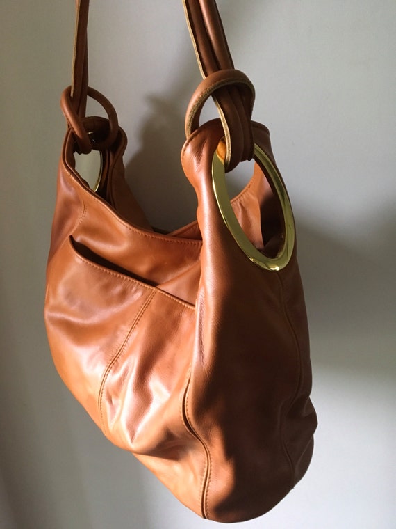 Real leather shoulder tote bag. So stylish and elegant with