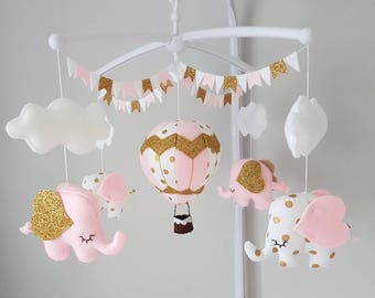 With MUSICAL CRIB ATTACHMENT Pink and gold giraffes and elephants baby girls musical mobile. Made to order