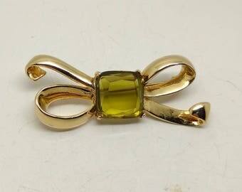 Vintage Gold Tone Bow with Smoky Lime Rhinestone Center Brooch