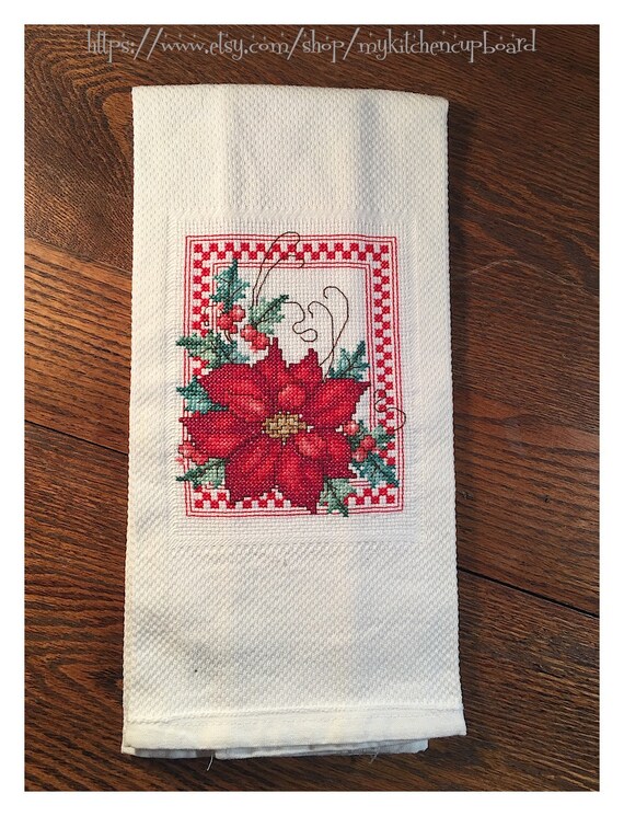 Cross stitch tea towel with poinsettia panel hand stitched