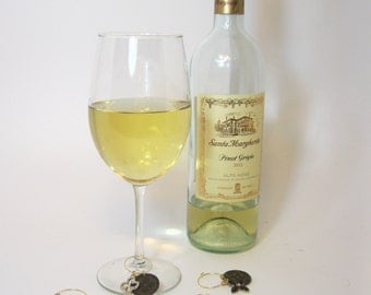 Louis Vuitton Wine Charms! Made from upcycled authentic LV. Only at The Palm Beach Closet! Many sets and designs!