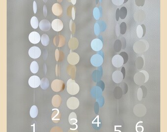 Garland decorative lozenge of glittery paper and cotton thread