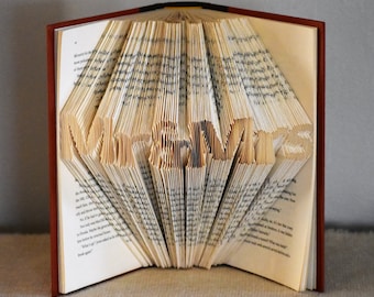 Wedding Centerpiece for Book Themed Wedding - Folded Book art Featuring the words "Mr & Mrs"