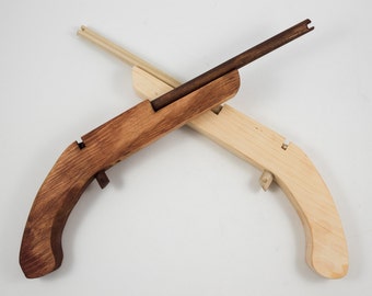 rubber band,rubber band gun,elastic gun,rubber band shooter,rubber band launcher,elastic shooter,toy rubber band gun,elastic band shooter