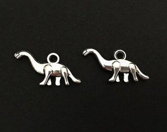 Dinosaur Charm. Lot of 10 / 20 / 30 / 40 / 50 / 100 PCS Silver Tone 2-sided Dinosaur Pendants. Handmade Jewelry Supplies. Craft Supplies.