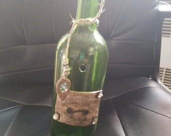 Wine bottle incense burner with quija board accent