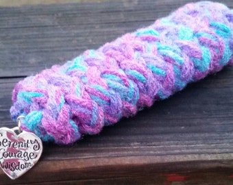 hand knitted, cast iron skillet handle cover with inspiring quote pendant