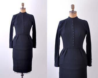 1950 vintage dress. black. 50's wool wiggle dress. xs. buttons. long sleeves.