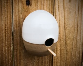 Egg inspired bird house