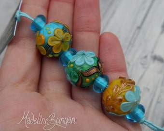Yellow, Turquoise and Green Flowers, rounds Lampwork bead mini set (3 + 4 spacers, 7 beads) SRA