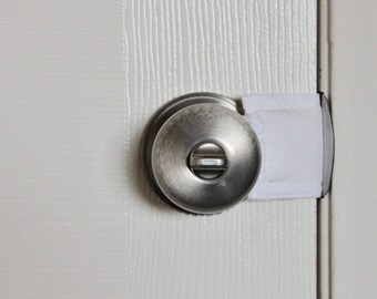 Latchy Catchy in All White (Patented) door latch cover for classrooms, school, teachers, school rooms.