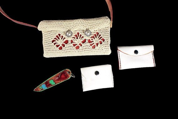 Handbag, Shoulder Bag, Purse, Leather Card Case, Leather Change Purse, Hand Tooled Key Chain, Winter White and Red, Handmade, Crochet Handbag, Shoulder Bag, Purse, Leather Card Case, Leather Change Purse, Hand Tooled Key Chain, Winter White and Red, Handmade, Crochet Handbag, Shoulder Bag, Purse, Leather Card Case, Leather Change Purse, Hand Tooled Key Chain, Winter White and Red, Handmade, Crochet Handbag, Shoulder Bag, Purse, Leather Card Case, Leather Change Purse, Hand Tooled Key Chain, Winter White and Red, Handmade, Crochet Handbag, Shoulder Bag, Purse, Leather Card Case, Leather Change Purse, Hand Tooled Key Chain, Winter White and Red, Handmade, Crochet 🔎zoom Request a custom order and have something made just for you. Item details 5 out of 5 stars. (61) reviews Shipping & Policies Handbag, Shoulder Bag, Purse, Leather Card Case, Leather Change Purse, Hand Tooled Key Chain, Red Leather Strap, Leather Interior, Winter White and Red, Pearl and Rhinestone Buttons, Handmade, Crochet A gorgeous and very versatile handmade crocheted shoulder bag. It has a 2 button closure, leather interior, red leather handle, and a hand tooled leather keychain. It also comes with a white leather card case with red stitching and a white leather mini change purse. The leather key chains design is a multicolored hearts. The bag is winter white with a spider stitch front in which red leather is seen underneath. The buttons are faux pearl and rhinestone to add a touch of elegance and bling. Size: 8 1/2 inches in length 4 1/4 inches in height 1 1/2 inches in width The bag is crocheted using Number 5 winter white crochet cotton. All leather is provided by Lawrence Carter from AcrossLeather here on Etsy. Lawrence is an expert leather artist. His shop carries a unique line of dog and cat collars, wallets, belts and more. www.etsy.com/shop/AcrossLeather The crocheting is done by myself, Patti Turon, here at ADKArtsBoutique. Here is a link to more of our purses and bags. https://www.etsy.com/shop/ADKArtsBoutique?section_id=14177951&ref=shopsection_leftnav_4 ADKArtsBoutique and Across Leather offers you the best handmade bags, purses, clutches, and totes. Every part of these bags is completely made by hand, by us. with love and attention to detail. © AcrossLeather Pet Collars, Leashes, and Beyond © ADKArtsBoutique © For People Who Have A Deep Love Of Things Adirondack. Meet the owners of ADKArtsBoutique Learn more about their shop and process Patti Turon Joseph Turon Seymour Montrose Weatherby Frequently asked questions about ADKArtsBoutique Custom and personalized orders Gift wrapping and packaging Handbag, Shoulder Bag, Purse, Leather Card Case, Leather Change Purse, Hand Tooled Key Chain, Winter White and Red, Handmade, Crochet