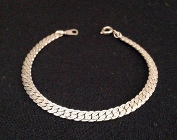 Storewide 25% Off SALE Vintage Silver Tone Elegantly Interlocked Designer Bracelet Featuring Raised Design Style Accent