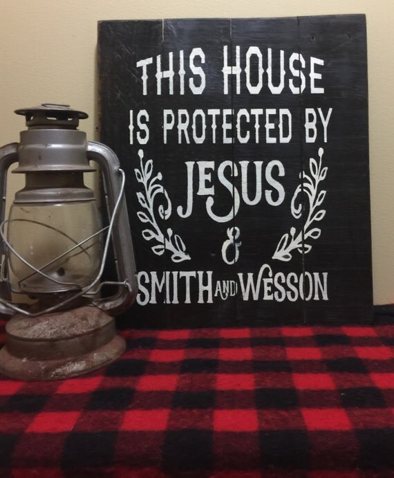 This House Is Protected By Jesus And Smith And Wesson 