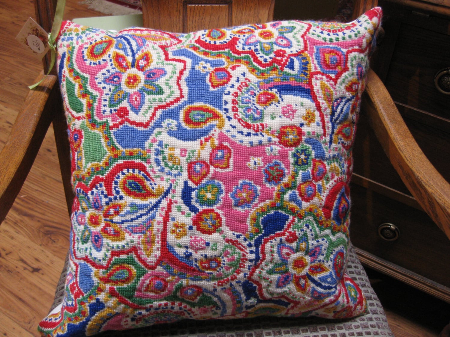 completed needlepoint pillow