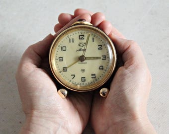 Vintage alarm clock, Soviet alarm clock, made in USSR, black and gold alarm clock, Mir, 11 Jewels