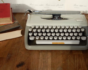 A Vintage Retro Adler Tippa Typewriter, with case,good condition.Desk addition, collectable, stationary
