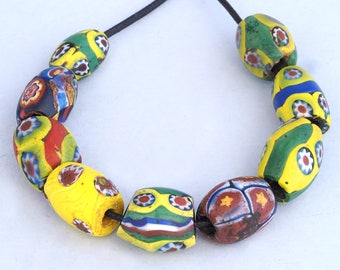 9 Antique venetian millefiori glass trade beads. African Trade