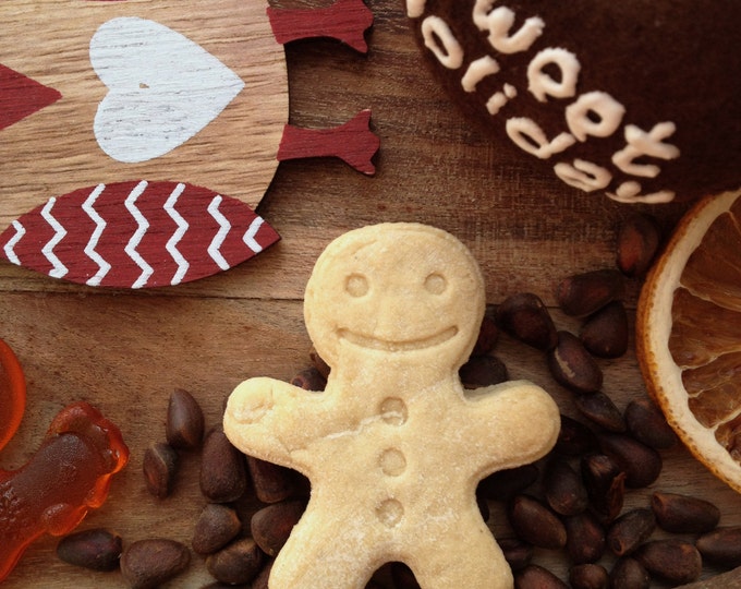 Gingerbread man cookie cutter. Festive Christmas party cookies. Christmas gift