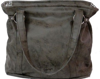 spacious shoulder bag made of synthetic leather