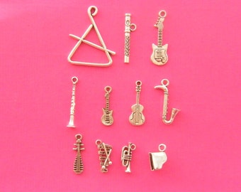 The Musical Instrument Collection - 11 different antique silver tone charms