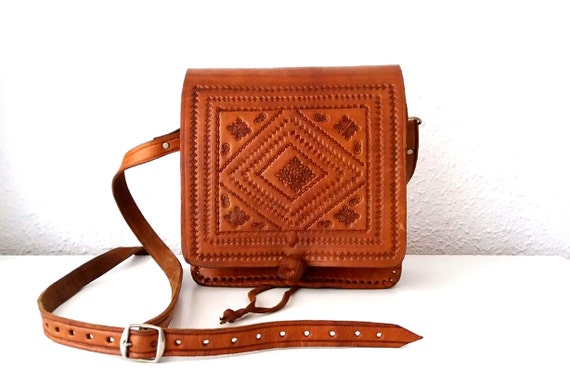 tooled leather crossbody bag