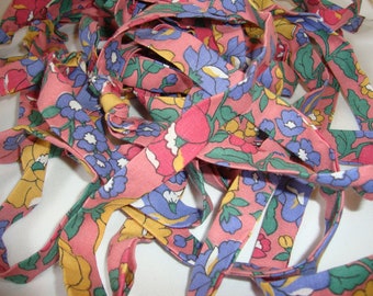 Pink Flowered Cotton Fabric Ribbon, 2 1/2 inch fabric folded to 3/4 inches wide, 7 1/2 yards of Knotted Fabric, Rag Rugs