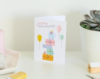 Carte Anniversaire - Petit chat mignon avec cadeaux et ballons