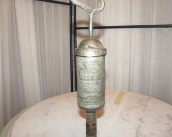 vintage Alemite Model 6550 push type grease gun Stewart Warner made in Chicago
