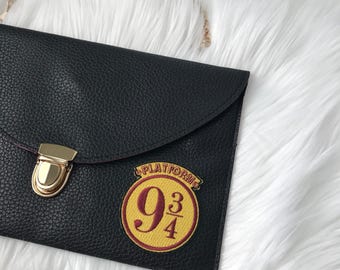 leather envelope clutch with patch / wizard train