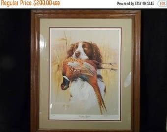 What is the value of a Ducks Unlimited framed print and coin?