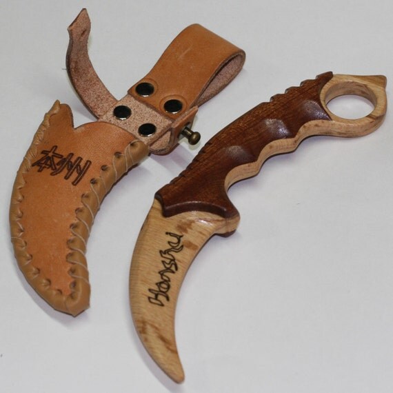 Toy wooden knife karambit with leather sheath
