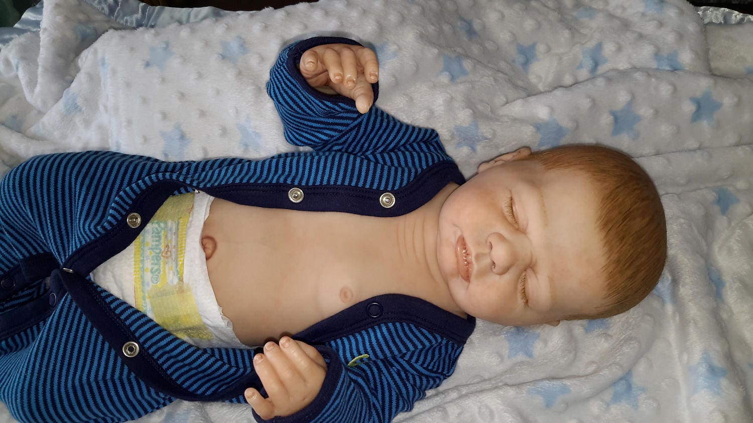 Anatomically correct Reborn baby boy doll. Has full body.