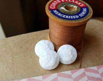 Antique white glass buttons