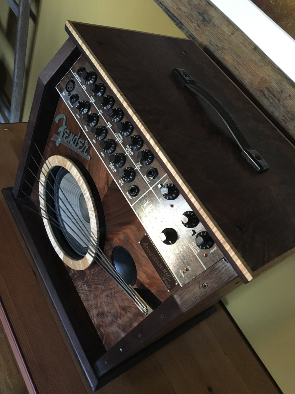 Acoustic Fender guitar amplifier in a handmade wooden case