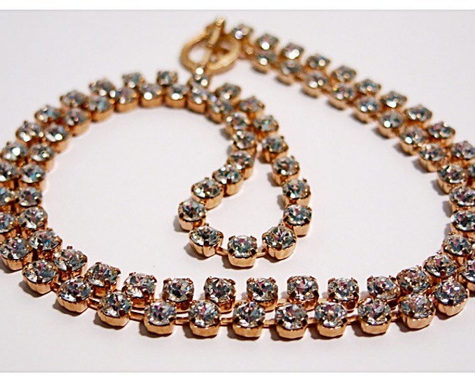 Make a statement with this long 32" clear Swarovski crystal chain necklace.
