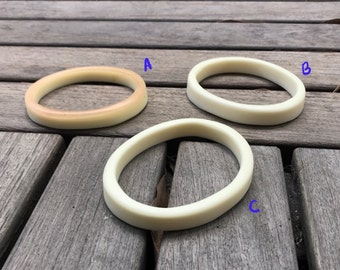 Thin matte white or light copper/matte white resin bangle
